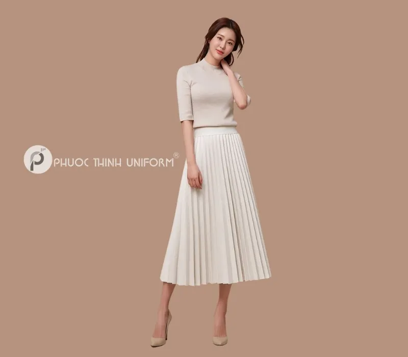 Top 15+ mẫu chân váy công sở dài qua gối đẹp, thanh lịch cho nữ văn phòng Mẫu chân váy dài qua gối xếp ly duyên dáng